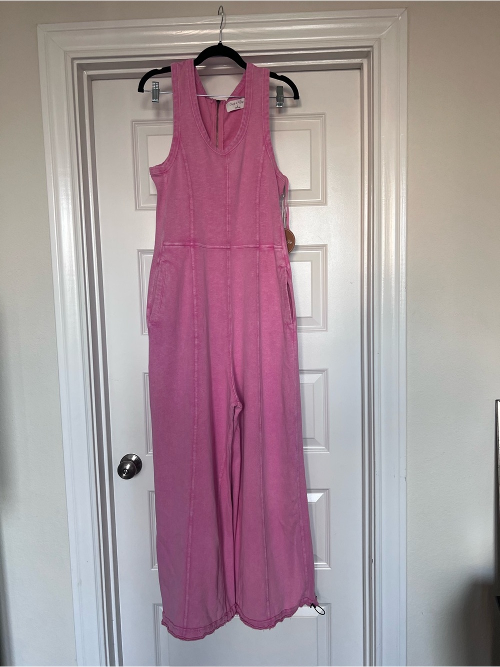 Sleeveless Pink Wide-Leg Romper with Waist Seam